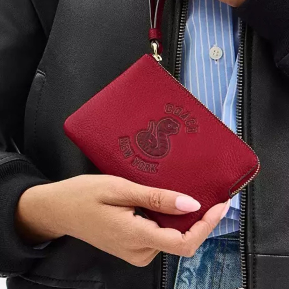 Coach 🆕 lunar new year collectible Wristlet With Graphic
year of the snake…